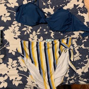 High waisted swim suit. New with tags and liner.